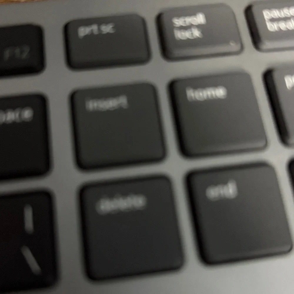 Sleek Black and Silver Laptop Keyboard